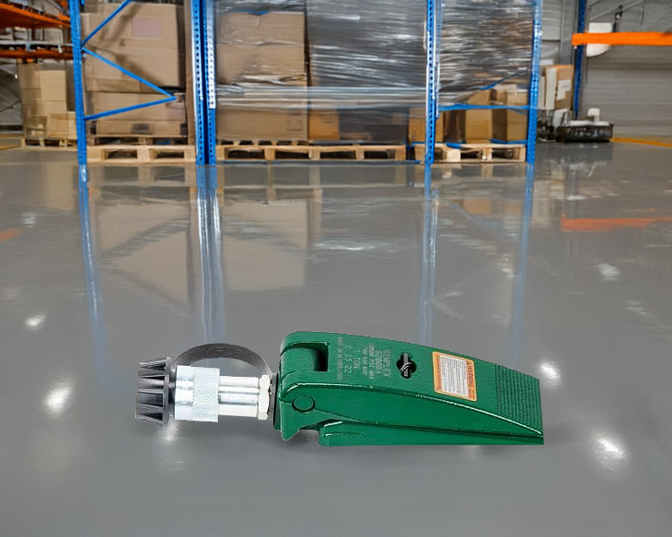 Two step ladders facing opposite directions in a large warehouse filled with rows of shelving units stocked with various boxes.